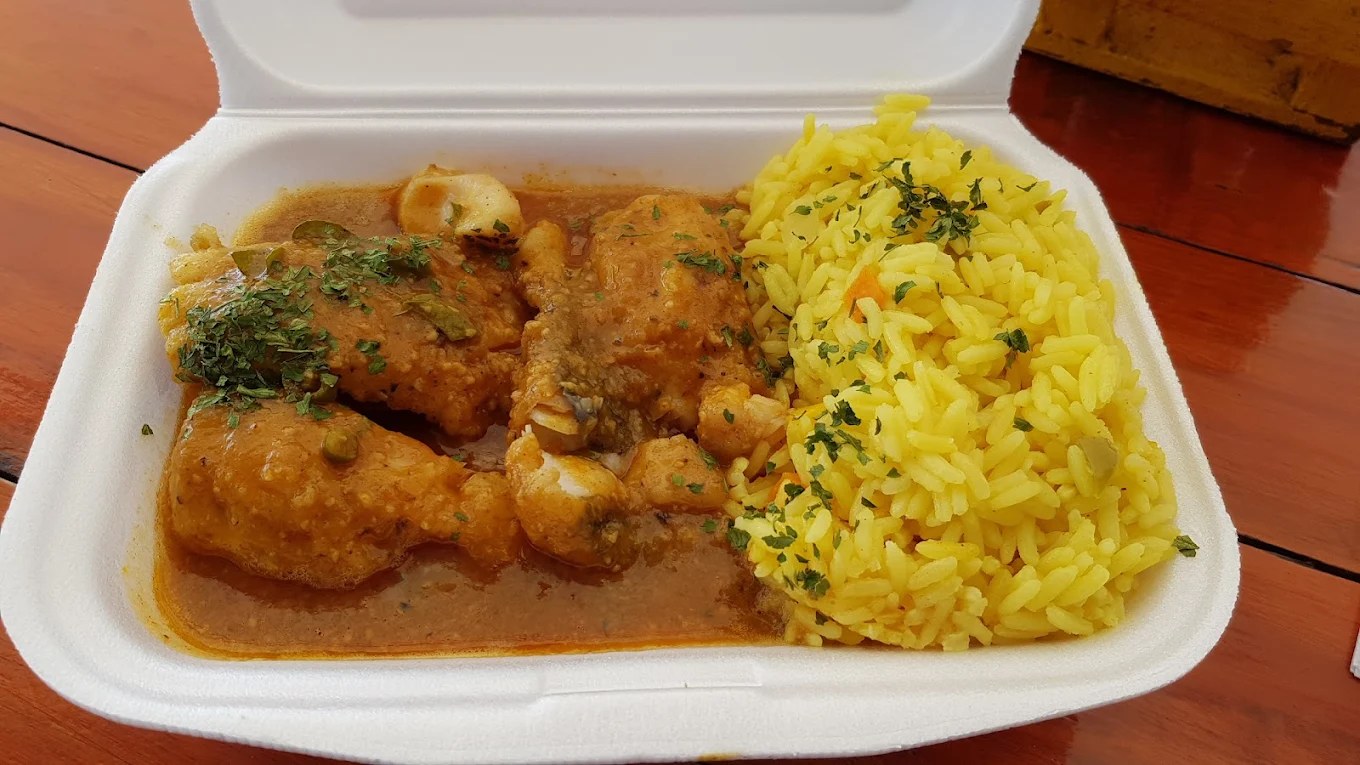 Fish curry with yellow rice