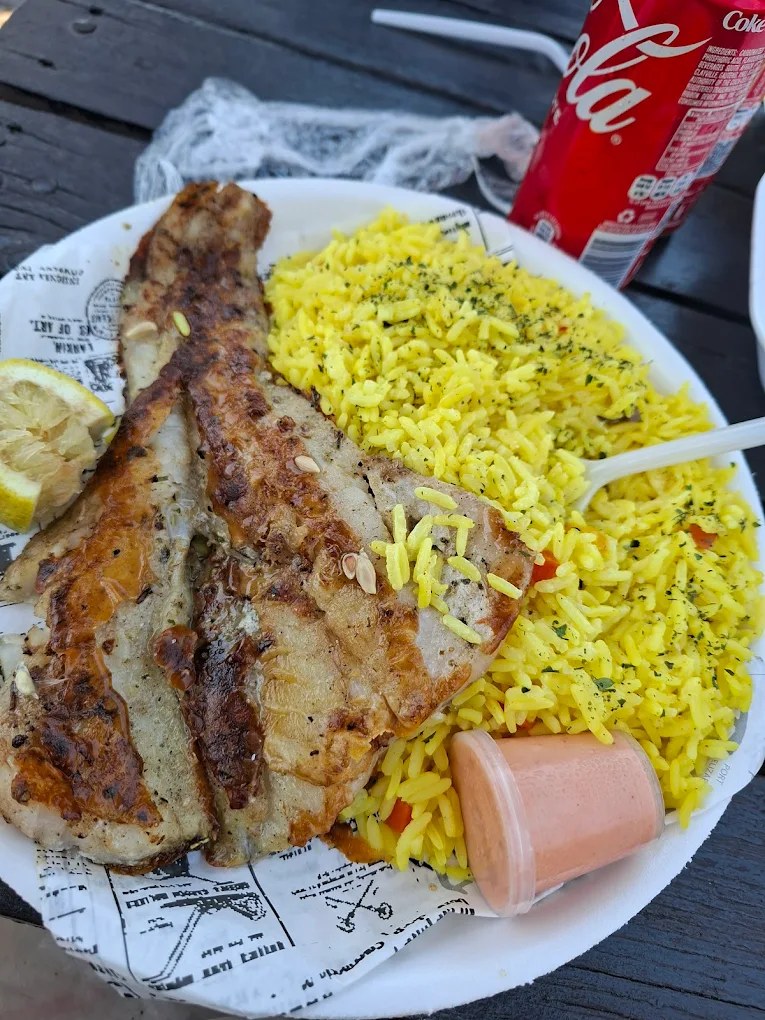 Grilled fish with yellow rice